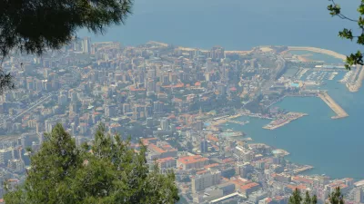 A Lebanon cityscape with a body of water in the background