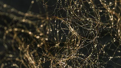 Close-up of a cell phone with a bunch of wires on it (decorative)