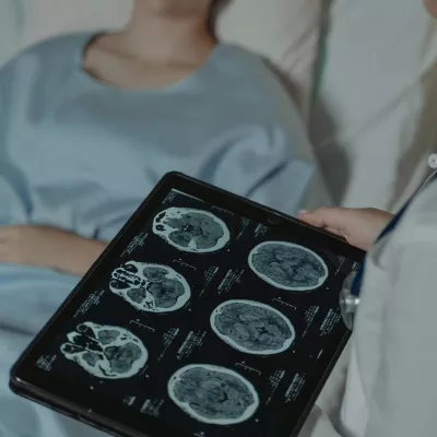 doctor consults MRI results with a patient